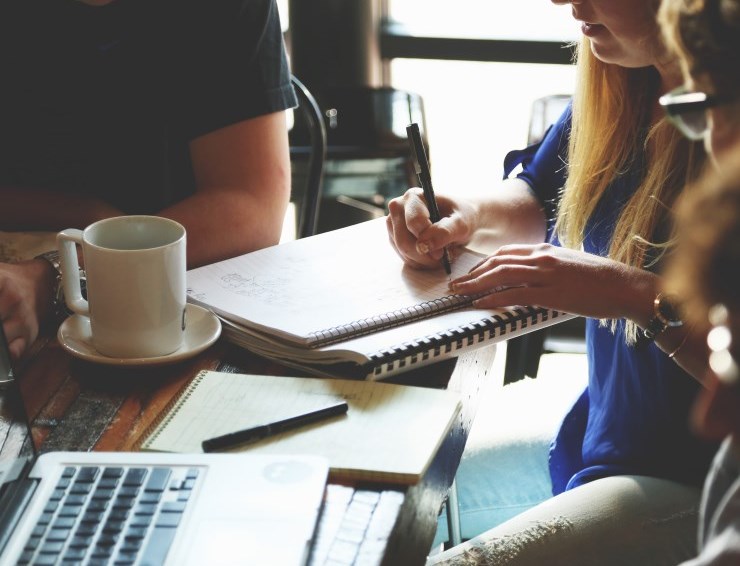 People working at a table together