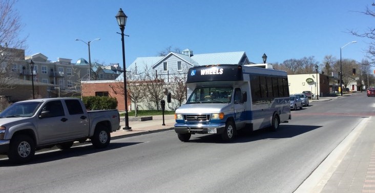 Wheels Bus driving down Albert St