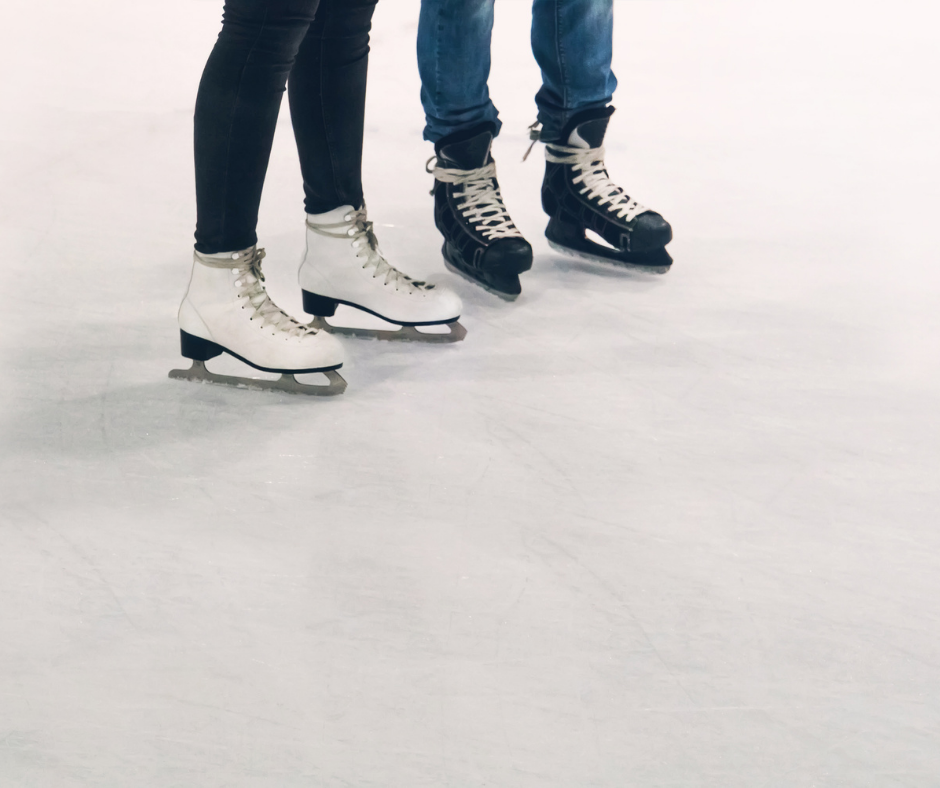 Two people with figure skates and hockey skates standing on ice