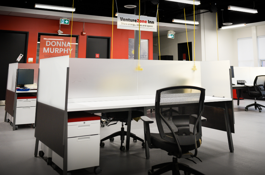 Dedicated desk protected by plexiglass within the Venture13 VentureZone